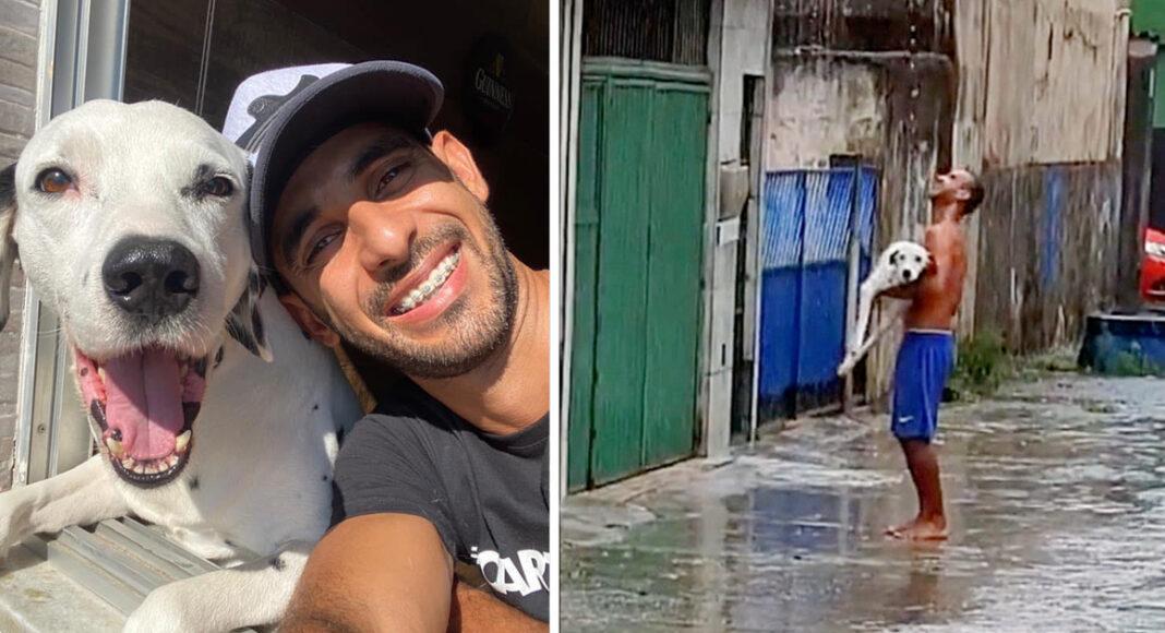 Man carries his paraplegic puppy in his arms to enjoy the rain: “He still loves it”